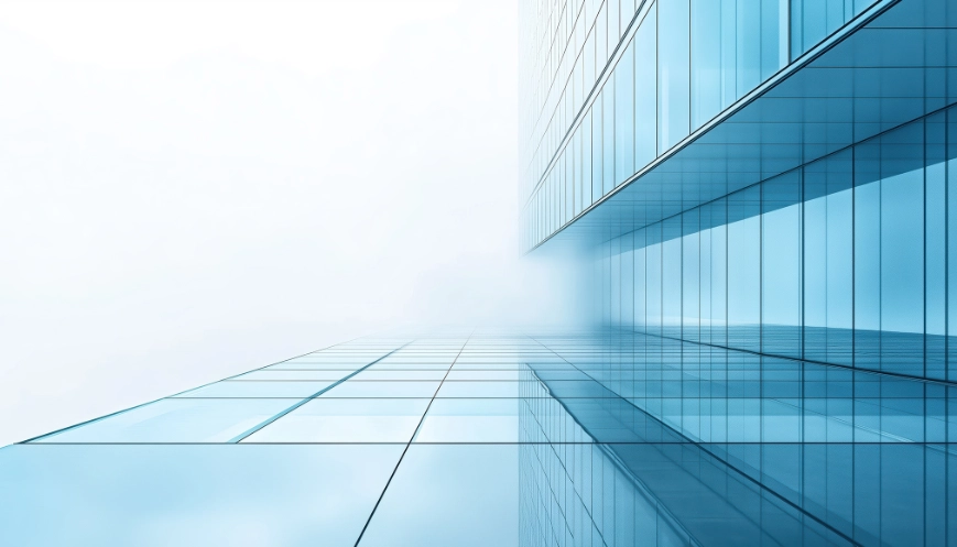 Image of a tall glass office building